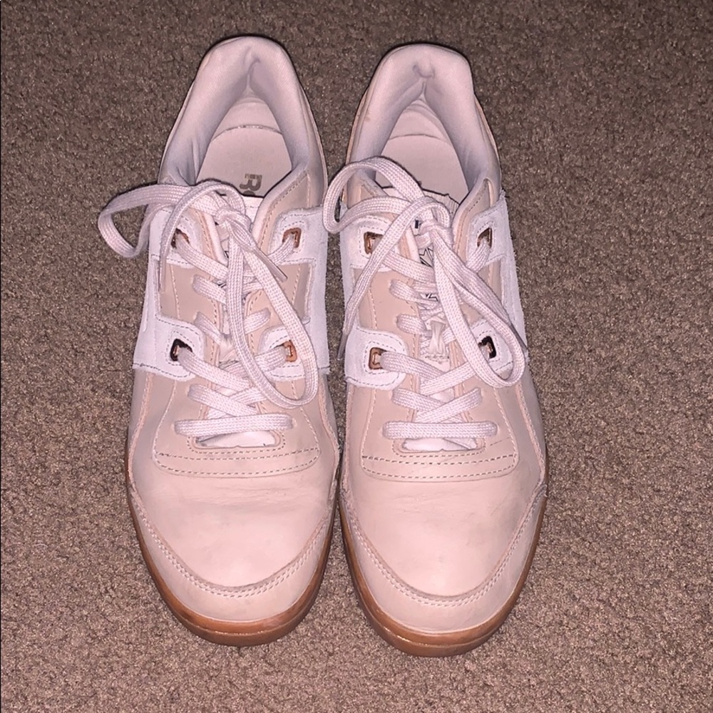 Reebok pink suede sneakers